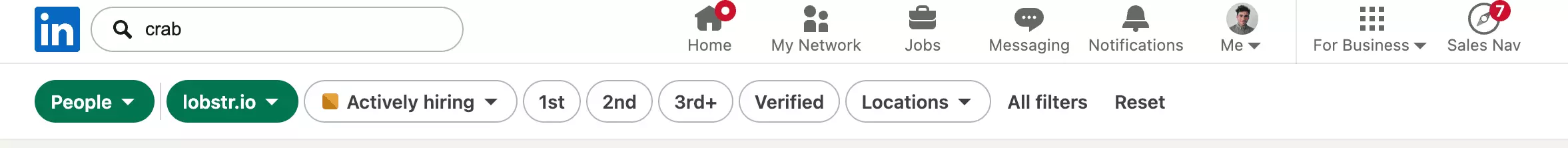 The same filter bar with a Current company filter applied, shown as a green lobstr.io pill